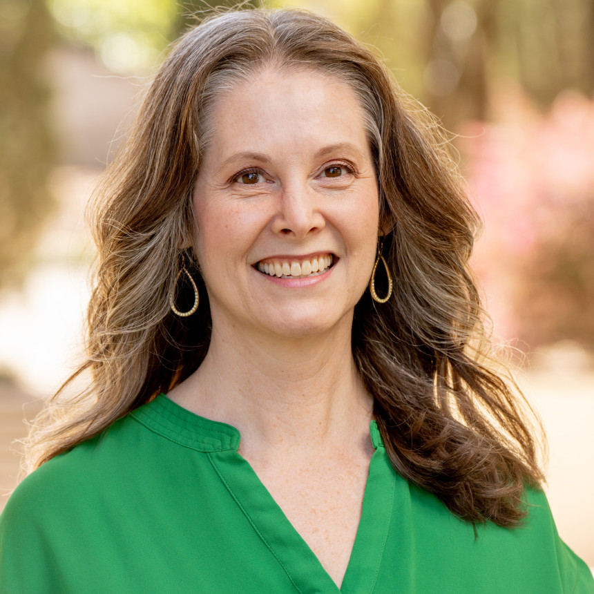 image of Jennifer Walker in a green shirt